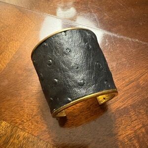 C. Wonder black and metal cuff bracelet